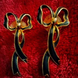 Black bowtie pierced earrings in like new condition